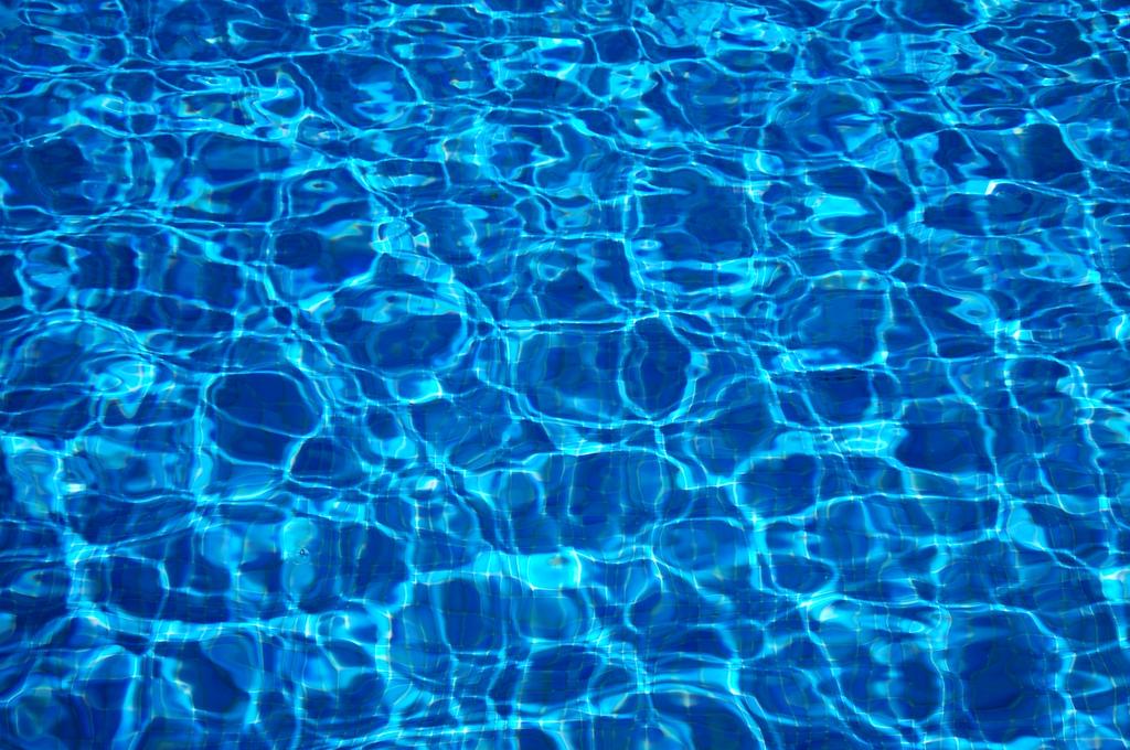 Ocean surface with sunlight penetrating water